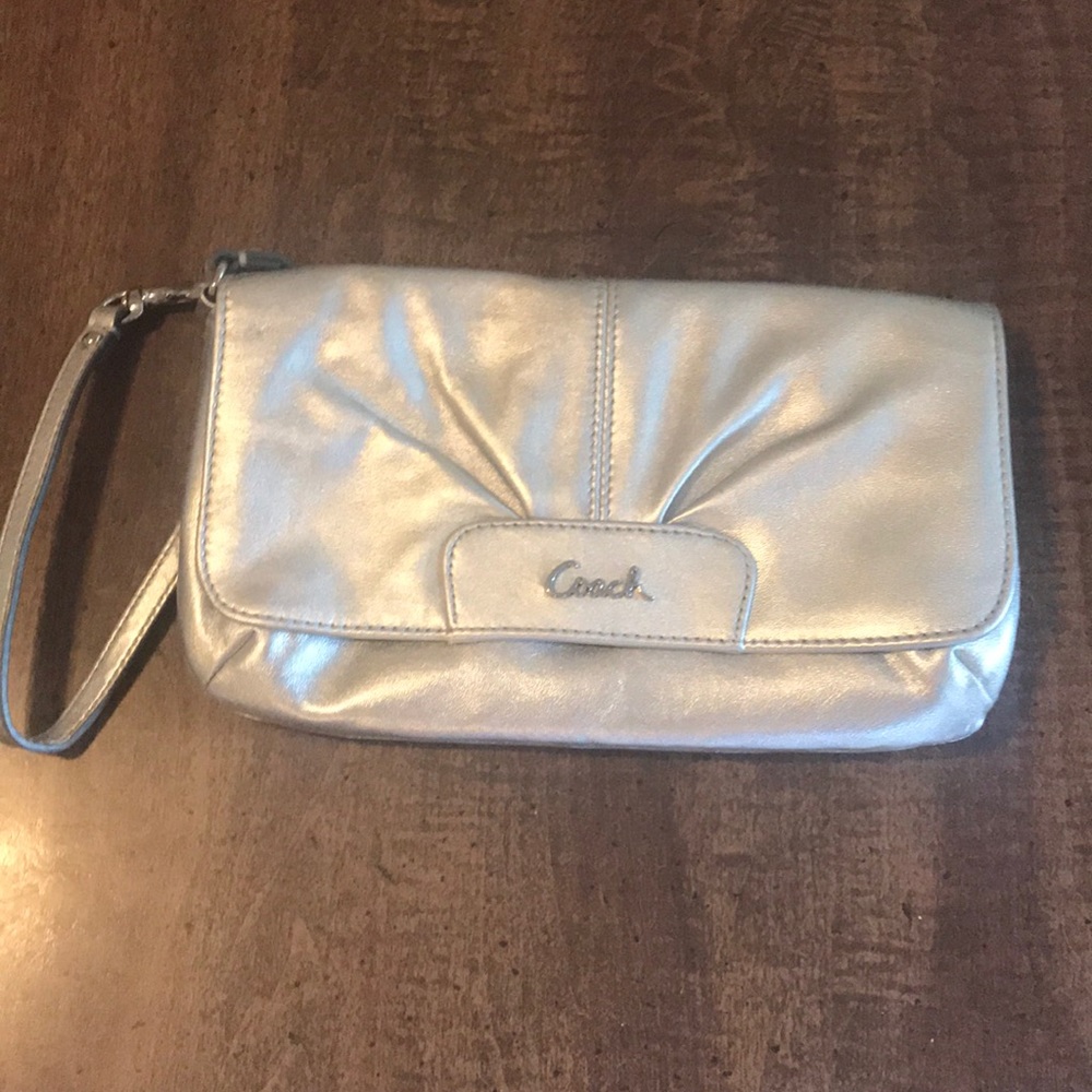 Silver clutch purse Coach